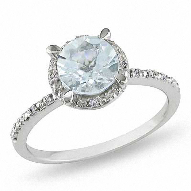 7.0mm Aquamarine and 0.05 CT. T.W. Diamond Frame Ring in Sterling Silver