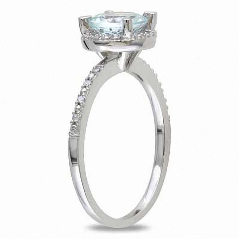 7.0mm Aquamarine and 0.05 CT. T.W. Diamond Frame Ring in Sterling Silver