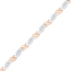 0.25 CT. T.W. Baguette Diamond "X" Bracelet in 10K Two-Tone Gold