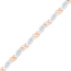 Thumbnail Image 0 of 0.25 CT. T.W. Baguette Diamond "X" Bracelet in 10K Two-Tone Gold