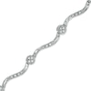 CT. T.W. Diamond Cluster Station Bracelet in 10K Gold
