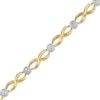 Thumbnail Image 1 of 0.13 CT. T.W. Diamond Cluster Infinity Link Bracelet in 10K Gold