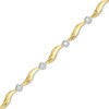 Thumbnail Image 0 of 0.16 CT. T.W. Diamond Cluster Station Bracelet in 10K Gold