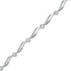 Thumbnail Image 1 of 0.16 CT. T.W. Diamond Cluster Station Bracelet in 10K White Gold