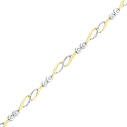 0.16 CT. T.W. Diamond Swirled Link Station Bracelet in 10K Gold
