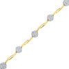 Thumbnail Image 0 of 0.33 CT. T.W. Diamond Cluster Wavy Station Bracelet in 10K Gold