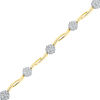 Thumbnail Image 1 of 0.33 CT. T.W. Diamond Cluster Wavy Station Bracelet in 10K Gold