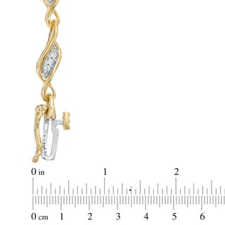 0.25 CT. T.W. Diamond Cascading Swirl Bracelet in 10K Gold