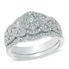 Thumbnail Image 1 of 1.00 CT. T.W. Diamond Cluster Twisting Bridal Set in 14K White Gold