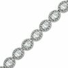 Oval Lab-Created Sapphire and 0.075 CT. T.W. Diamond Bracelet in Sterling Silver