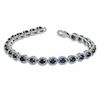Thumbnail Image 2 of Oval Blue Lab-Created Sapphire and 0.075 CT. T.W. Diamond Bracelet in Sterling Silver - 7.5"