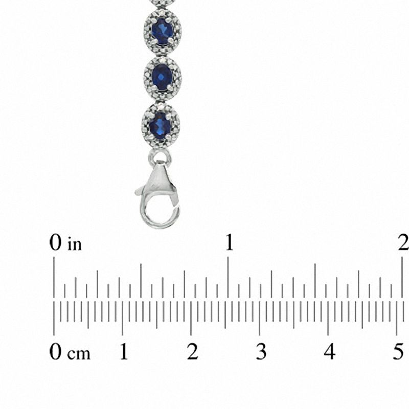 Main Image 3 of Oval Blue Lab-Created Sapphire and 0.075 CT. T.W. Diamond Bracelet in Sterling Silver - 7.5"