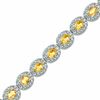 Thumbnail Image 1 of Oval Lab-Created Yellow Sapphire and Diamond Accent Bracelet in Sterling Silver - 7.5"