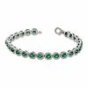 Thumbnail Image 2 of Oval Lab-Created Emerald and 0.075 CT. T.W. Diamond Bracelet in Sterling Silver - 7.5"