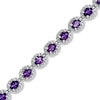 Thumbnail Image 1 of Oval Amethyst and 0.075 CT. T.W. Diamond Bracelet in Sterling Silver - 7.5"