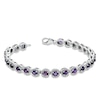 Thumbnail Image 1 of Oval Amethyst and 0.075 CT. T.W. Diamond Bracelet in Sterling Silver - 7.5"