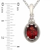 Oval Garnet and Lab-Created White Sapphire Pendant and Earrings Set in Sterling Silver