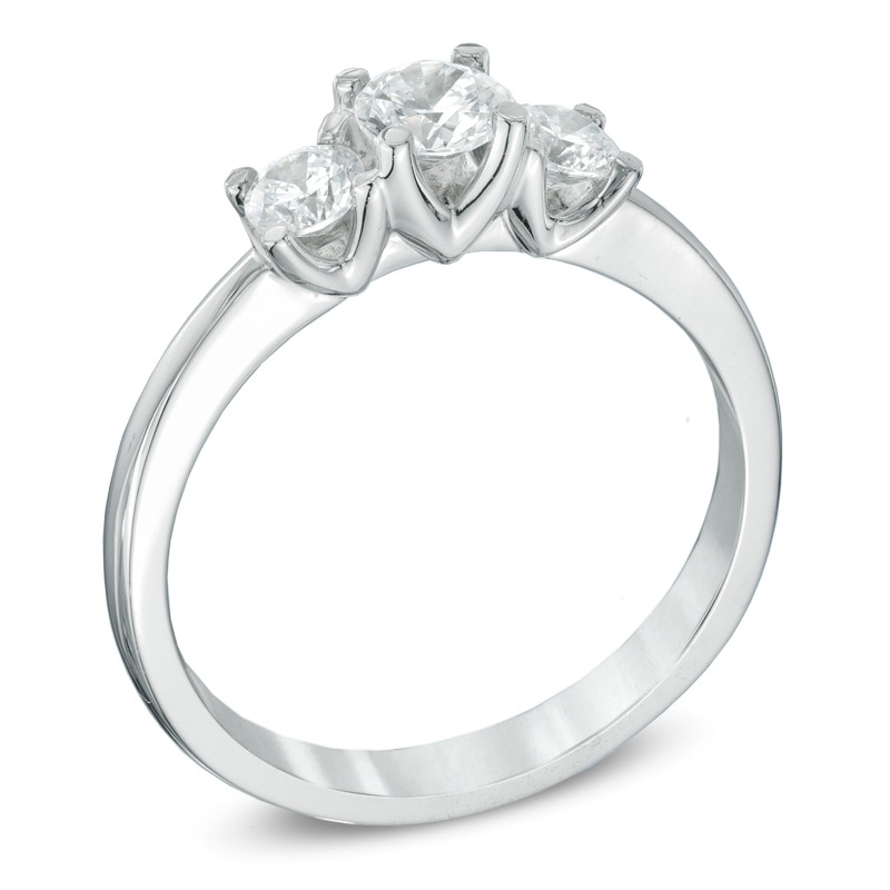 0.60 CT. T.W. Certified Canadian Diamond Three Stone Engagement Ring in 14K White Gold (I/I2)
