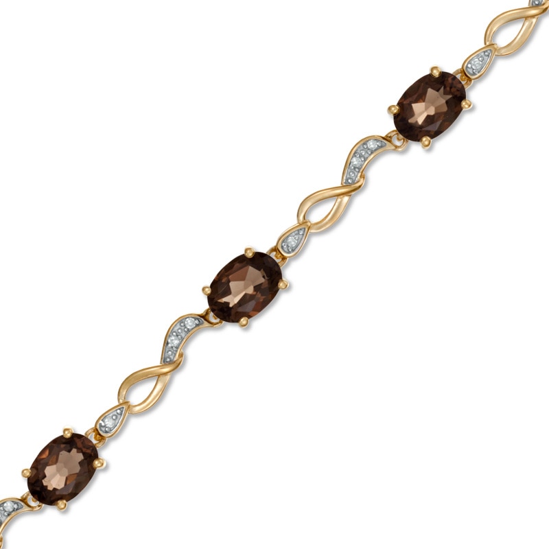 Oval Smoky Quartz and Diamond Accent Bracelet in 10K Gold - 7.25"