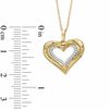Thumbnail Image 1 of The Heart Within™ 0.10 CT. T.W. Diamond Heart Pendant in 10K Gold