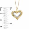 Thumbnail Image 2 of 0.10 CT. T.W. Diamond Heart Pendant in 10K Gold