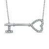 Thumbnail Image 1 of 0.10 CT. T.W. Diamond Sideways Heart-Top Key Necklace in Sterling Silver