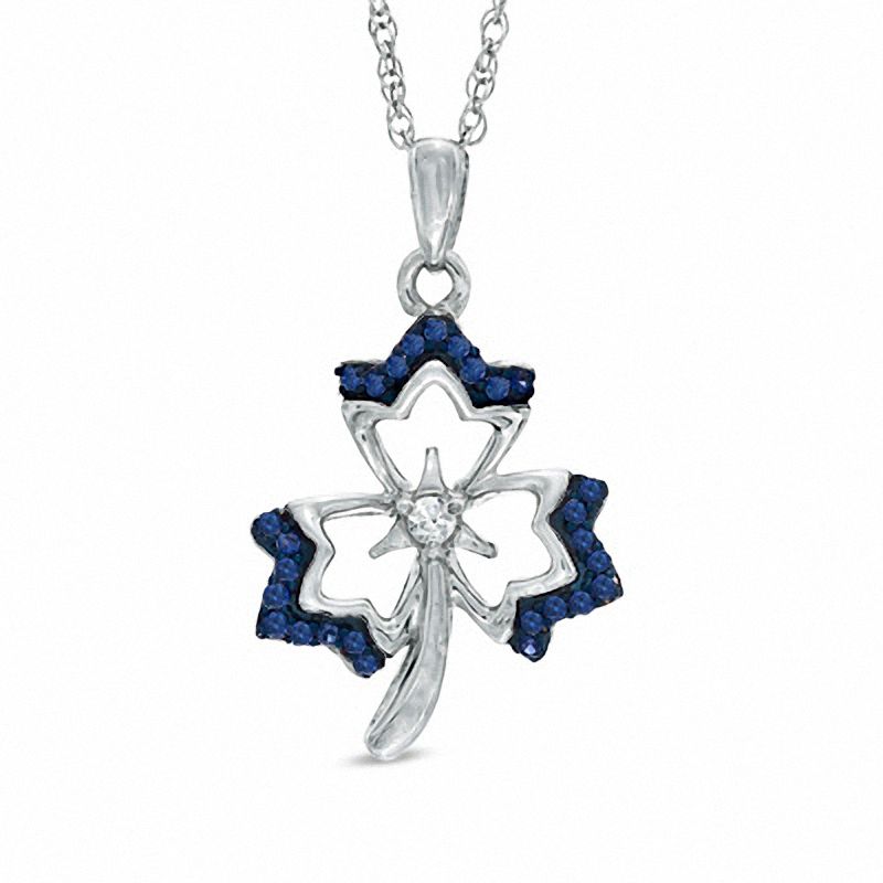 0.13 CT. T.W. Enhanced Blue and White Diamond Maple Leaf Pendant in 10K White Gold