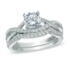 1.10 CT. T.W. Canadian Certified Diamond Split Shank Bridal Set in 14K White Gold (I/I2)