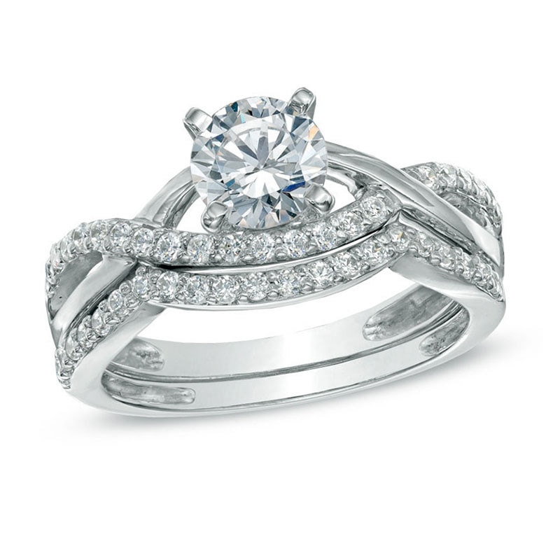 1.00 CT. T.W. Certified Canadian Diamond Split Shank Bridal Set in 14K White Gold (I/I2)
