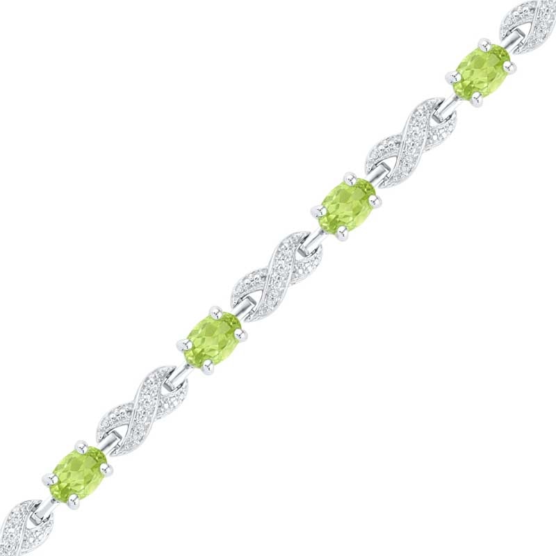 Main Image 1 of Oval Peridot and 0.10 CT. T.W. Diamond Bracelet in Sterling Silver - 7.5"