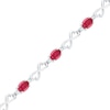 Oval Lab-Created Ruby and White Sapphire Heart Infinity Bracelet in Sterling Silver - 7.5"