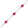 Thumbnail Image 0 of Oval Lab-Created Ruby and White Sapphire Heart Infinity Bracelet in Sterling Silver - 7.5"