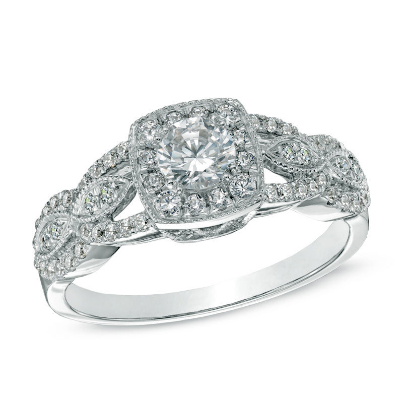 Celebration Canadian Ideal 0.70 CT. T.W. Certified Diamond Frame Vintage-Style Engagement Ring in 14K White Gold (I/I1)