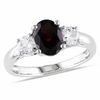 Oval Garnet and Lab-Created White Sapphire Three Stone Ring in Sterling Silver