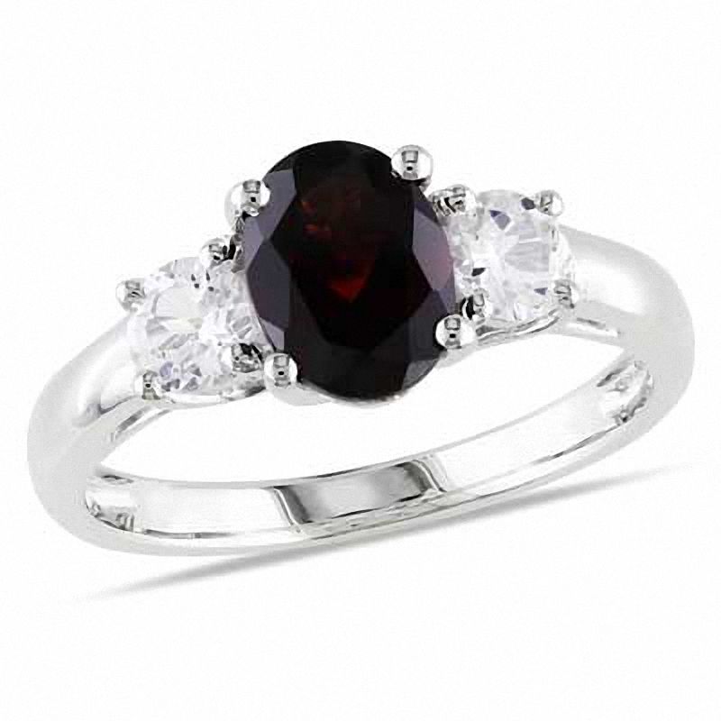 Oval Garnet and White Lab-Created Sapphire Three Stone Ring in Sterling Silver