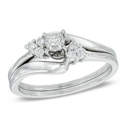 0.16 CT. T.W. Diamond Three Stone Slant Bridal Set in 10K White Gold