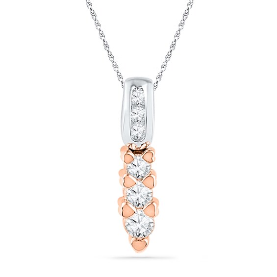 0.25 CT. T.W. Diamond Pendant with Heart-Shaped Accents in 10K Two-Tone Gold