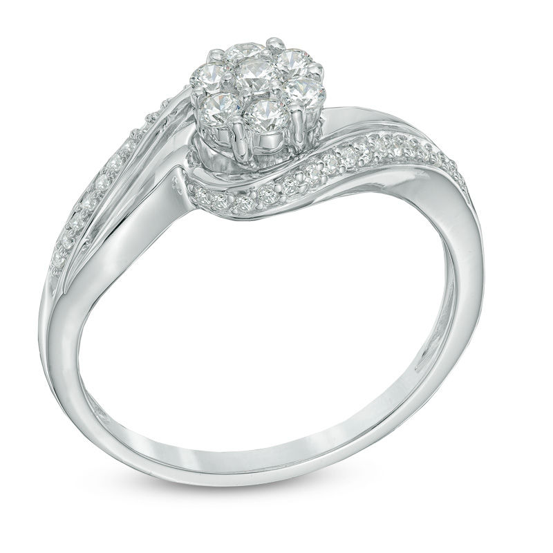 0.33 CT. T.W. Diamond Cluster Swirl Engagement Ring in 10K White Gold