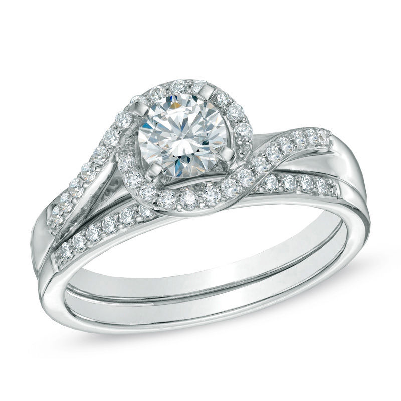 Celebration Canadian LuxÂ® 0.73 CT. T.W. Certified Diamond Swirl Bridal Set in 18K White Gold (I/SI2)