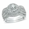 1.25 CT. T.W. Diamond Twist Bridal Set in 14K White Gold