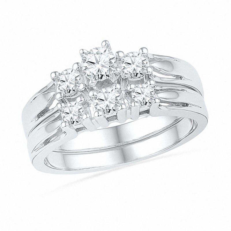 0.63 CT. T.W. Diamond Three Stone Bridal Set in 10K White Gold