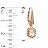 Thumbnail Image 2 of Oval Morganite and 0.12 CT. T.W. Diamond Drop Earrings in 10K Rose Gold