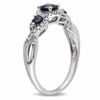 Thumbnail Image 1 of 4.0mm Blue Sapphire and 0.12 CT. T.W. Diamond Three Stone Ring in 10K White Gold