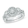 Thumbnail Image 1 of 0.95 CT. T.W. Diamond Cluster Three Stone Bridal Set in 14K White Gold