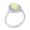 Oval Yellow Opal and Sky Blue Topaz Frame Ring in 10K White Gold