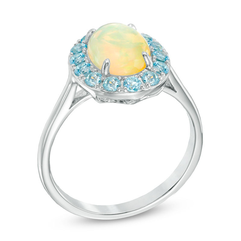 Oval Yellow Opal and Sky Blue Topaz Frame Ring in 10K White Gold