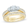 Thumbnail Image 0 of 1.20 CT. T.W. Diamond Past Present Future Bridal Set in 14K Gold