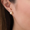 Thumbnail Image 1 of Textured Button Swirl Stud Earrings in 10K Gold