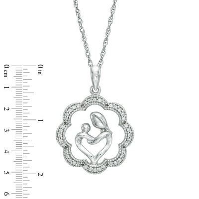 0.15 CT. T.W. Diamond Motherly Love Flower Pendant in Sterling Silver