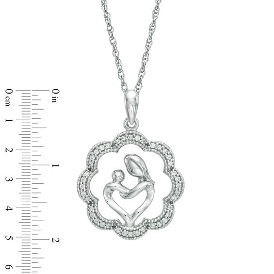 0.15 CT. T.W. Diamond Motherly Love Flower Pendant in Sterling Silver